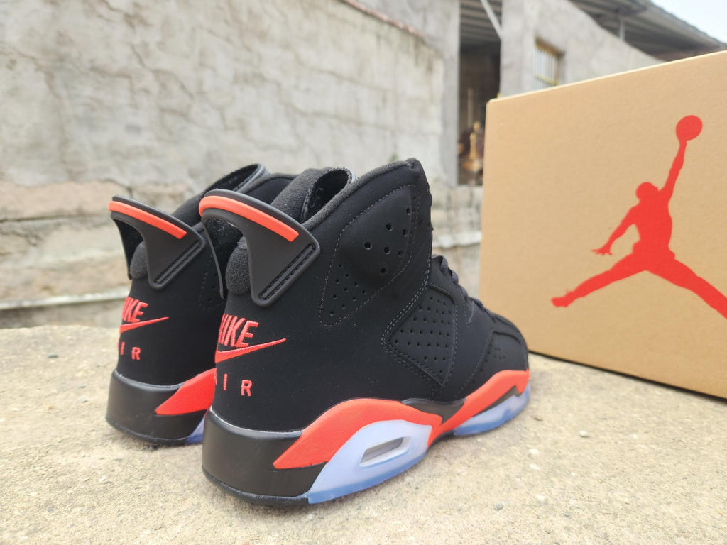 Air Jordan 6 – Black & Bright Red with Blue Sole Accents